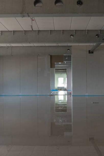 istock on a construction site the liquid screed was poured on the ground 1252839321