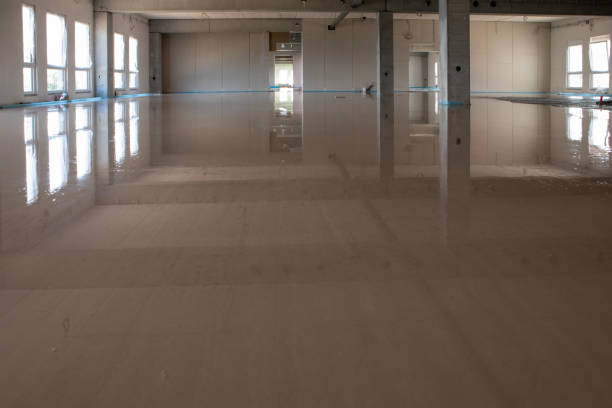 istock on a construction site the liquid screed was poured on the ground 1252839322