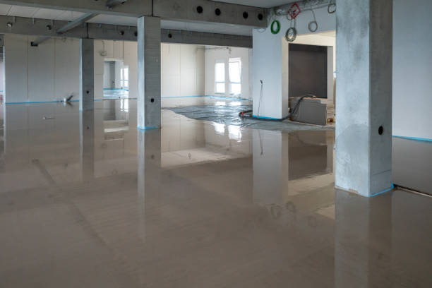 on a construction site the liquid screed was poured on the ground