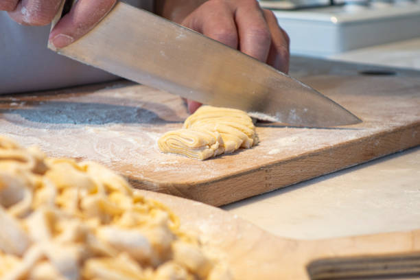 istock Homemade noodle cutting 1252839367
