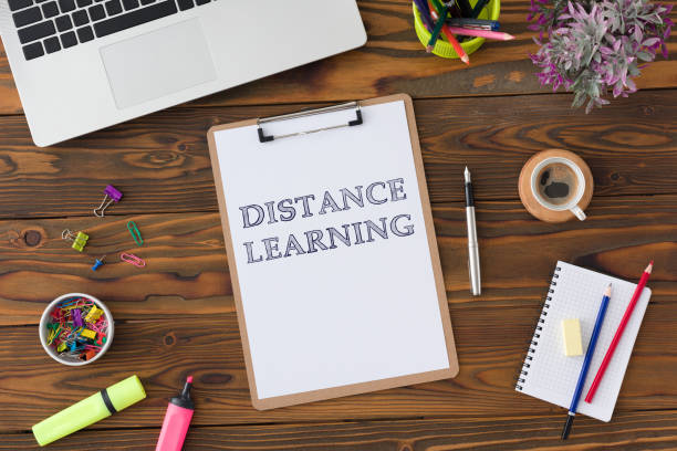istock Distance Learning Concept With Stationery Supplies And Computer On Desk 1252842926