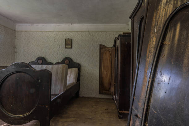istock dark bed an closets in a abandoned room 1252849411