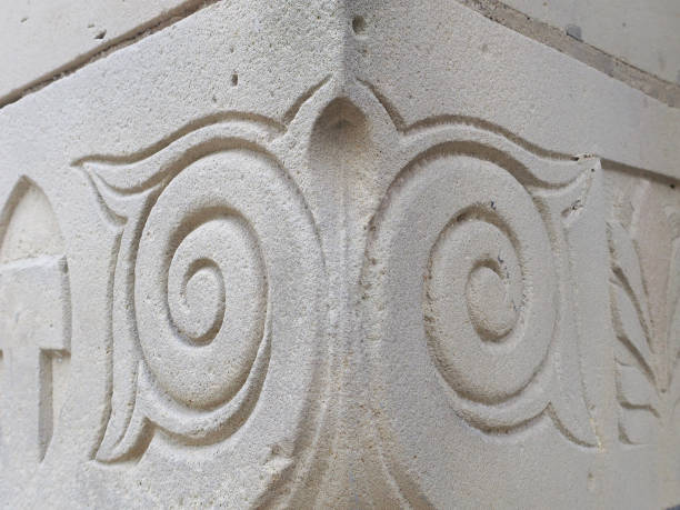 istock corner stone with two spirals carved in sandstone 1252854930