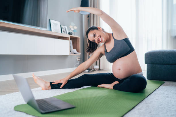 istock Pregnant women doing Pilates 1252857279