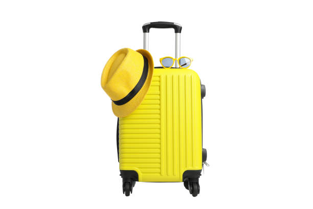 istock Travel bag with sunglasses and hat isolated on white background 1252861937
