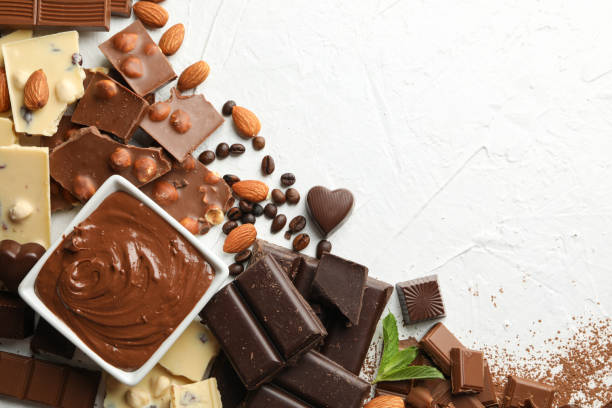 istock Chocolate, melted chocolate, coffee and almond on white background 1252863138