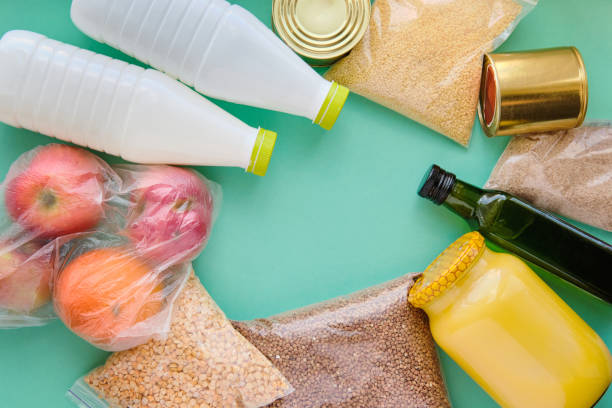 istock Donation food during quarantine, different products on a blue background 1252864327