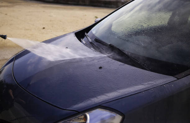 istock Washing a car with pressurized water 1252867422