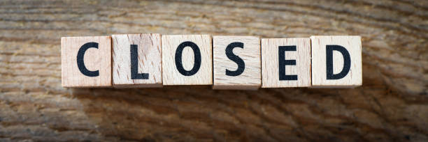 istock CLOSED word arranged from wooden letters. 1252867476
