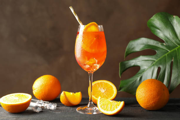 istock Composition with Spritz cocktail on wooden table. Summer drink 1252867610