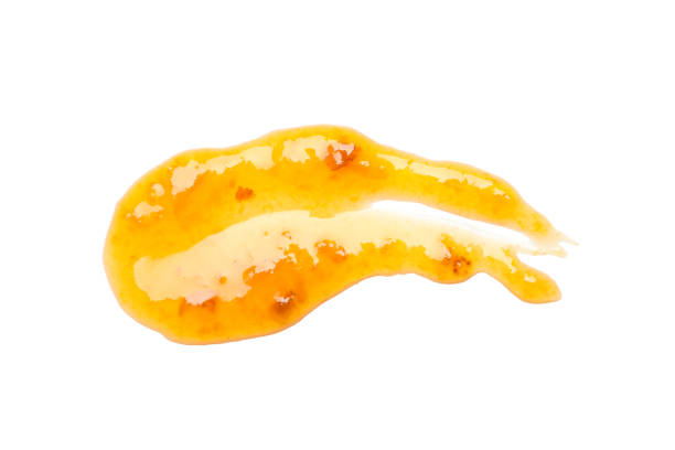 istock Apricot jam isolated on white background, close up 1252868834