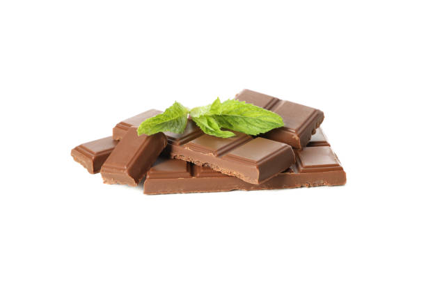 istock Tasty chocolate and mint isolated on white background 1252870158