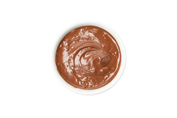 istock Bowl with melted chocolate isolated on white background 1252870798