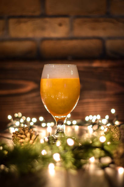 istock Christmas beer with christmas lights and background 1252870995
