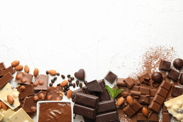 istock Chocolate, melted chocolate, coffee and almond on white background 1252871299