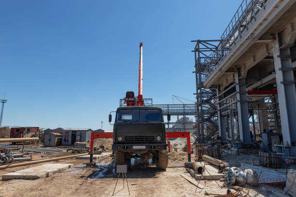 istock A mobile truck with a lifting boom stands on construction site 1252871884