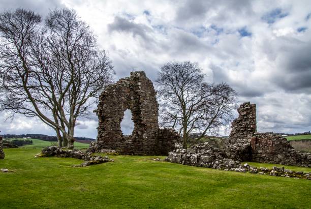 istock Old Rock Wall Ruin In Meadow. Scotland. 1252874918