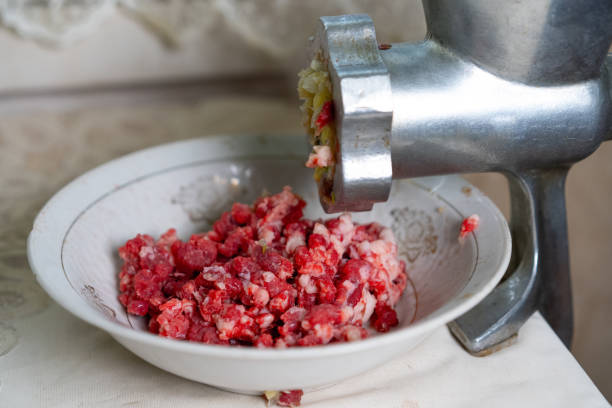 istock Manual meat grinder and minced meat in a plate 1252876742