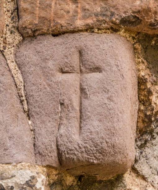 istock Crosses Carved In Stones. 1252877694