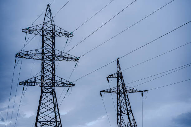 istock Electric poles with power lines 1252877842