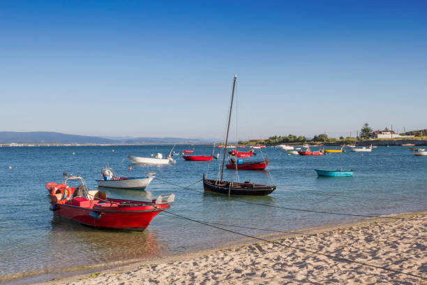 istock Anchored boats in Arousa Island 1252880085