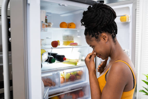 istock Rotten Fruit Bad Smell In Open Fridge 1252880915