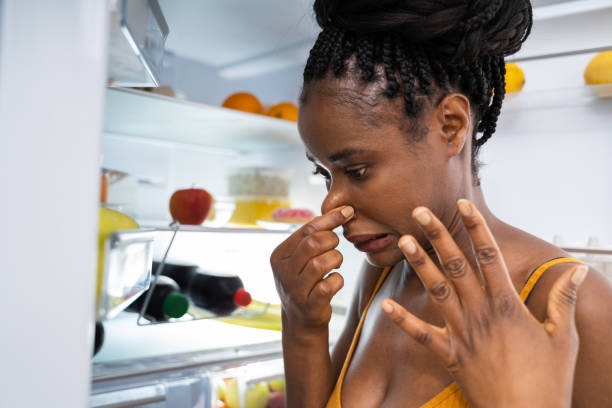 istock Rotten Fruit Bad Smell In Open Fridge 1252880930