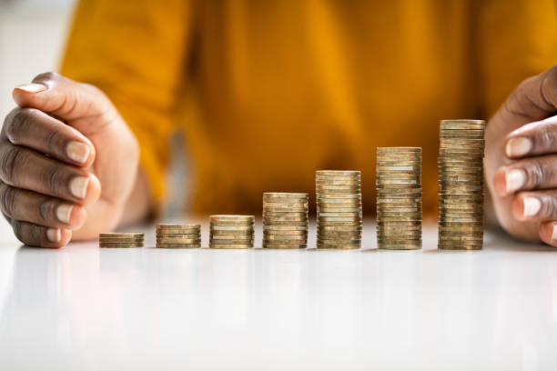 istock African Woman Protecting And Securing Money 1252881215