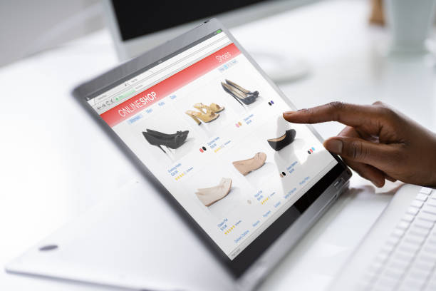 istock Young African American Woman Using Convertible Laptop 1252882972