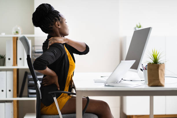 Back Pain Bad Posture Woman Sitting Back Pain Bad Posture Woman Sitting In Office backache photos stock pictures, royalty-free photos & images