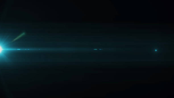 istock Anamorphic lens flare from a photo camera lens. Anamorphic background 1252884208