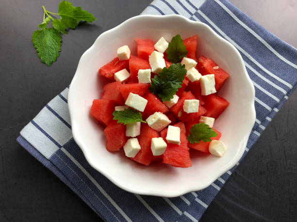istock Watermelon feta cheese salad with fresh mint. 1252886889