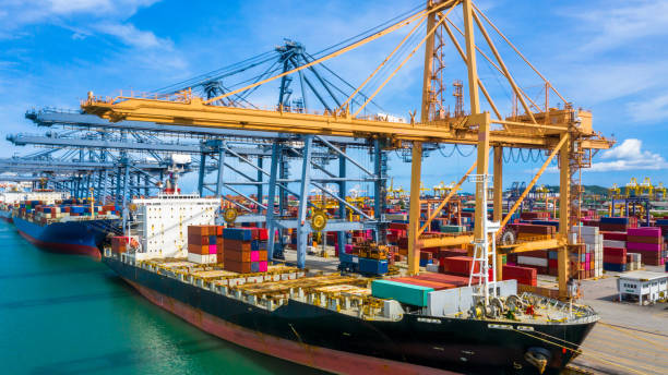 istock Aerial view container cargo ship, import export commerce global business trade logistic and transportation of International by container cargo ship boat, Freight shipping maritime sea port terminal. 1252890089
