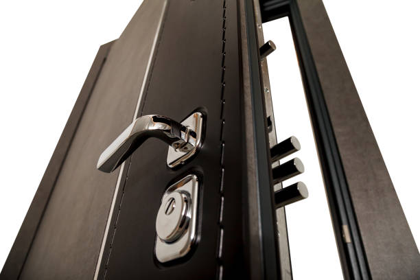 istock An open door with locks 1252893978