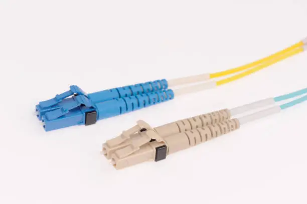 Photo of Fiber optic cables isolated on grey background