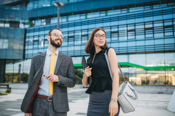 istock Colleagues in front of the office building 1252895427