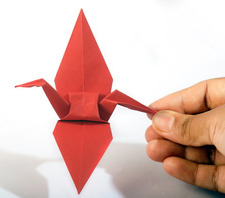 Origami is the art of paper folding, which is often associated with Japanese culture. In modern usage, the word \