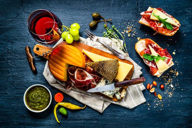 istock Traditional Spanish tapas and wine on dark background. 1252901176