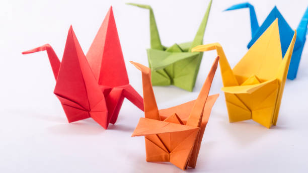 istock Colorful origami Crane bird dancing sequence. 1252901827