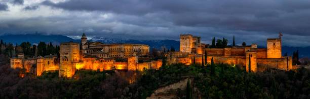 istock Thunderclouds over the Alhambra. Night panoramic view of Alhambra. Andalusia, Spain 1252902322