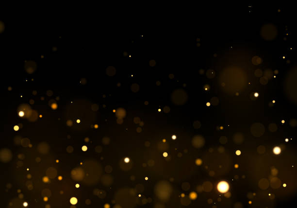 Light bokeh effect Light bokeh effect. Glitter and elegant for Christmas. Gold, yellow sparkling magical dust particles. Magic concept. Abstract blur on black background. Vector gold layer stock illustrations