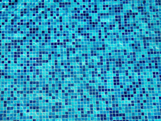 istock Surface of blue ripped water in swimming pool 1252909123