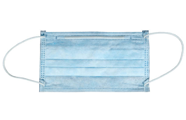 istock Blue medical mask is isolated on a white background. 1252909293
