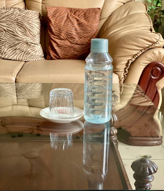 istock Water bottle and drinking glass 1252909588