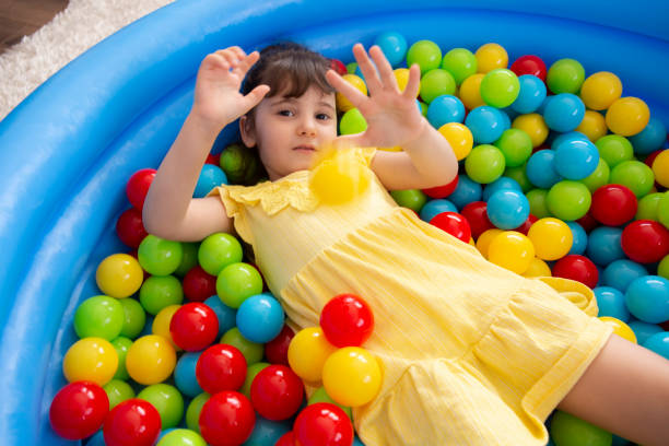 istock Little girl playing 1252910446