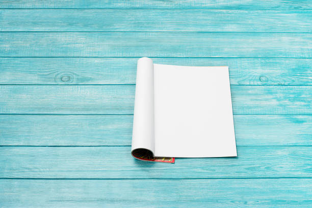istock Mock-up magazine, newspaper or catalog on blue background. Blank page 1252922520