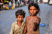 Poor Indian children asking for help