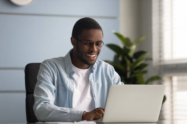 istock African freelancer do remote job typing message on laptop 1252926534