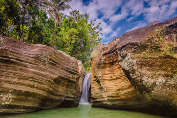 THE BEAUTY OF WATERFALL IN INDONESIA stock photo