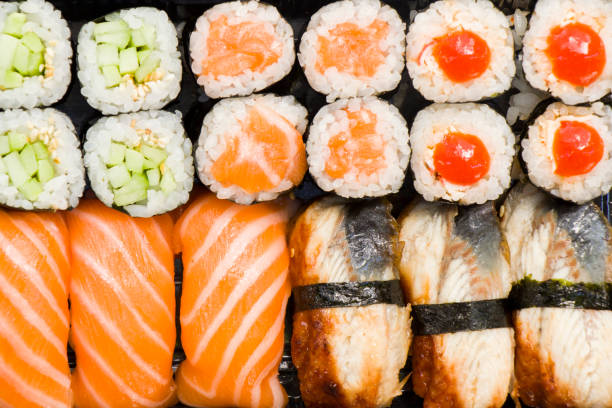 istock Sushi set on the table, Seafood and vegetables. Close-up and macro 1252929957